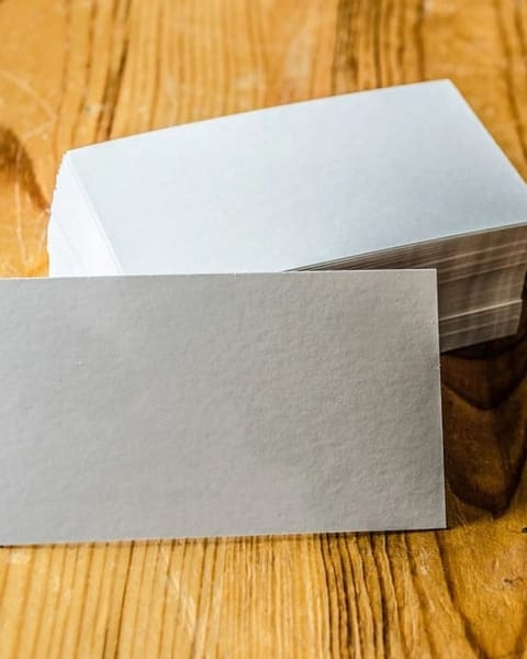 Stack of blank cards on wood