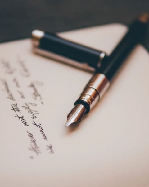 Fountain pen on a handwritten letter