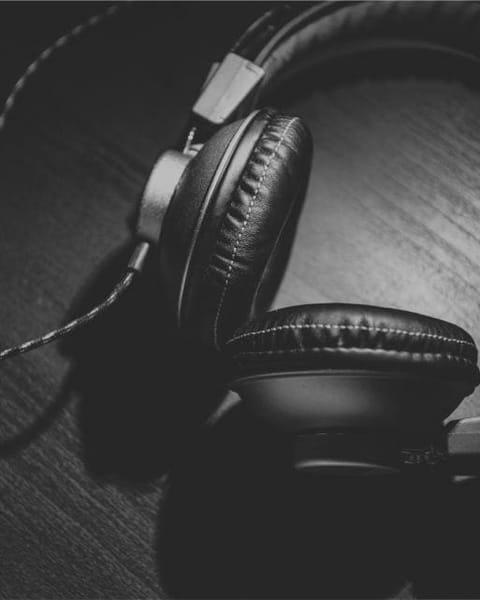 Black headphones in low light