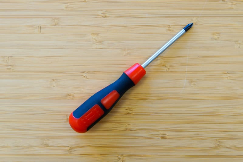 Screwdriver on a bamboo board