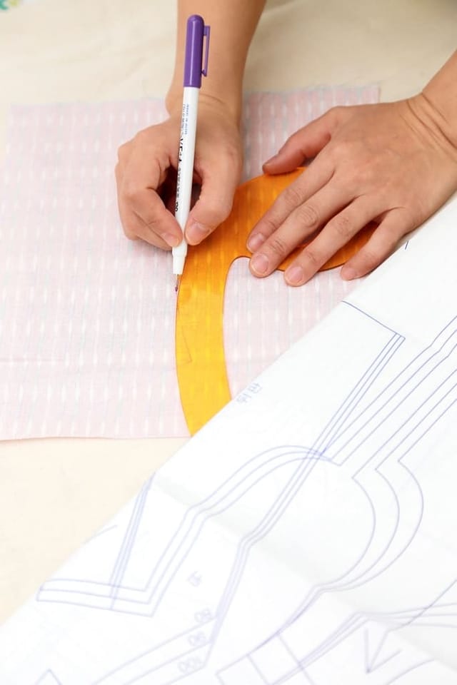 Pattern being drafted with ruler and pen