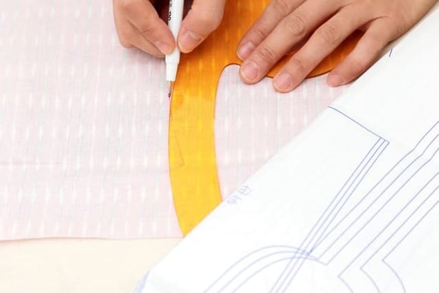 Pattern being drafted with ruler and pen