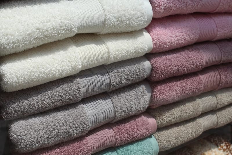 Stacked towels in pastel shades