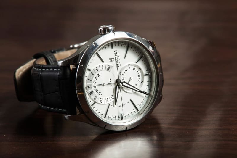 Automatic watch with white dial and leather strap